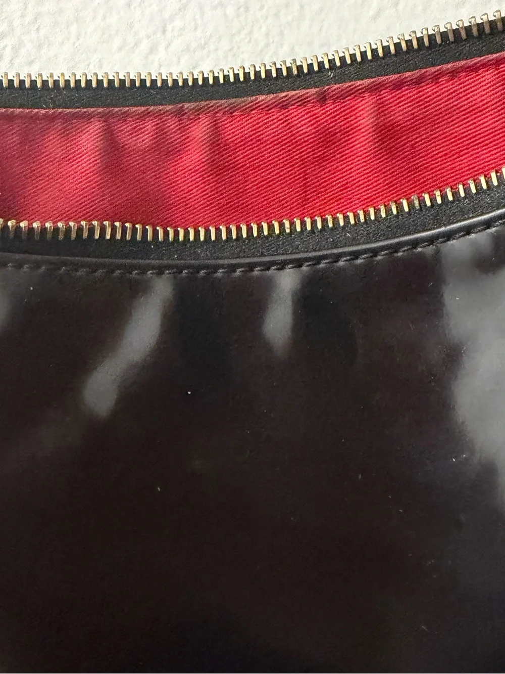 Dooney & Bourke Black Patent Shoulder Bag with Tan Trim and Red Lining